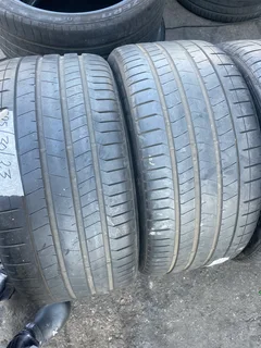 A clean set of 325 30 23 Pirelli tyres with 90% treads available for sale