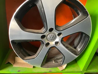 A clean set of 18inch original golf rims available for sale