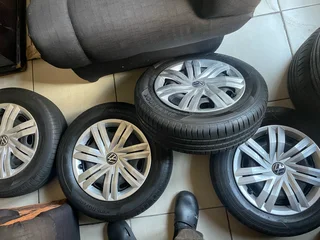 A clean set of 14inch polo steel rims tyres and wheel covers available for sale