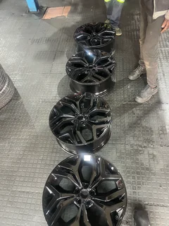 A clean set of 21inch Range Rover Evogue and Velar Original rims with tyres available for sale