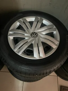 A clean set of 14inch polo steel rims tyres and wheel covers available for sale