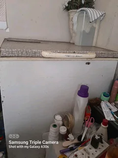 Selling deep fridge, couch and drawer