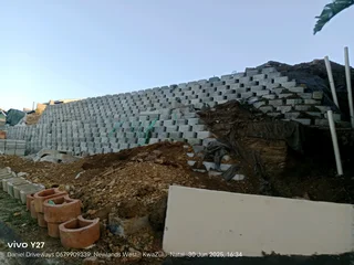 Retaining walls and concrete driveways