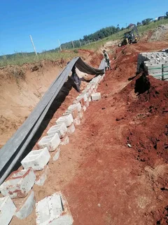 We do tarring paving retaining walls precast fencing concrete driveways and building