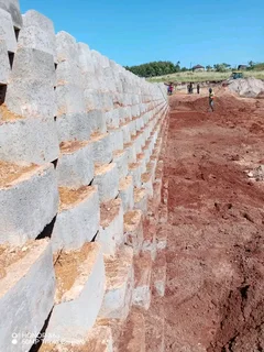 We do tarring paving retaining walls precast fencing concrete driveways and building