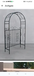 garden arbor or trellis with a gate