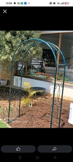 garden arbor or trellis with a gate