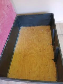 Wooden box for toys or linen.