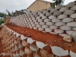 G Blocks Retaining And Tar Road Installation