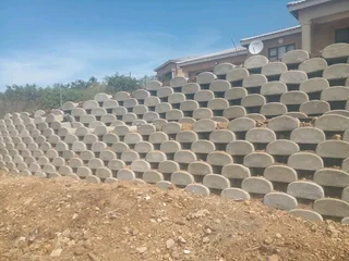 G Blocks Retaining And Tar Road Installation