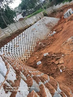 Specialist Ln G Blocks Retaining And Tar Road Installation