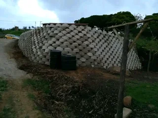 G BLOCKS RETAINING AND TAR ROAD INSTALLATION