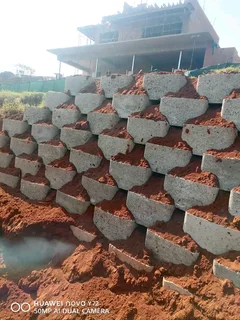 G BLOCKS RETAINING AND TAR ROAD INSTALLATION