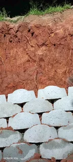 G Blocks Retaining And Tar Road Installation