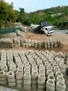 G Blocks Retaining And Tar Road Installation