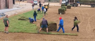 Fit and supply kikuyu grass with top soil? Compost