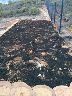 Fit and supply kikuyu grass with top soil? Compost