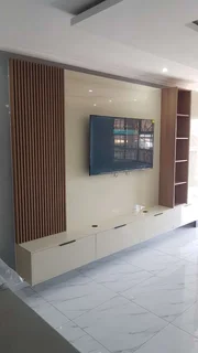 SKILLED, COMPETENT, PROFESSIONAL AND EXPERIENCED CARPENTER.