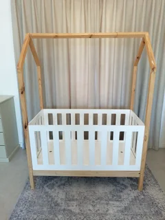 House shaped cot from Pinkfoot Boutique