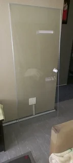 Toughened shower door glass