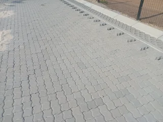 Kerb and paving