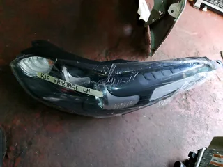 Kia Sportage left side headlight,