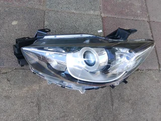 Mazda CX-5 left side headlight is a normal one,