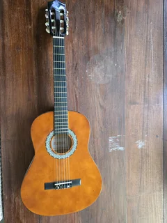 Sonata Acoustic Guitar with carry bag, both in very good condition.