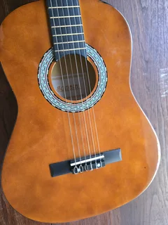 Sonata Acoustic Guitar with carry bag, both in very good condition.