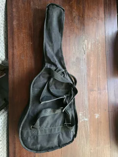Sonata Acoustic Guitar with carry bag, both in very good condition.