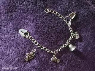 Sterling Silver vintage charmed bracelet