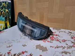 Hyundai exter right front upper headlight