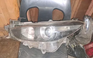 Mazda 3 left front headlight