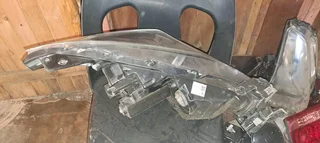 Mazda 3 left front headlight