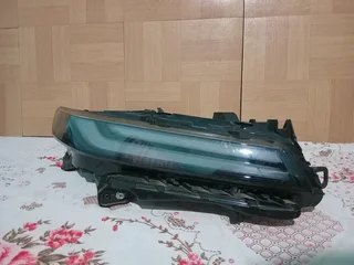 Toyota starlet cross right front upper headlight