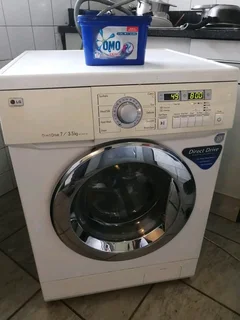 7/3.5KGS WHITE LG DIRECT DRIVE FRONT LOADER WASHER AND DRYER COMBO MACHINE