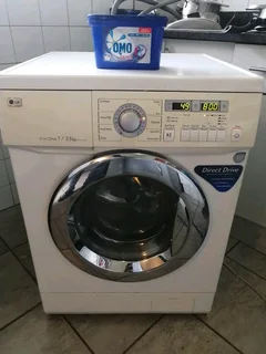7/3.5KGS WHITE LG DIRECT DRIVE FRONT LOADER WASHER AND DRYER COMBO MACHINE