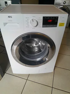 7KGS WHITE AEG FRONT LOADER WASHING MACHINE