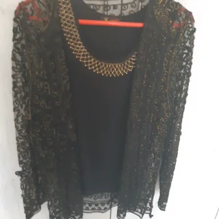 Beautiful evening jacket in black and gold