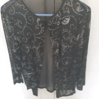 Silver and black jacket in very good condition