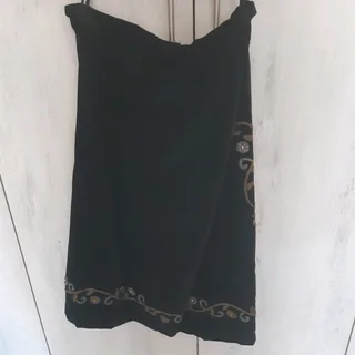 Beautiful black velvet skirt with black and gold scallops on the side and at the bottom of the skirt