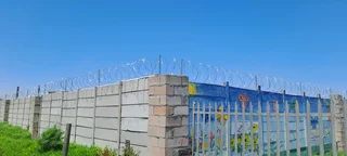 Razor wire and gate installation