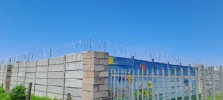 Razor wire and gate installation