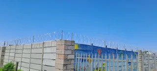 Razor wire and gate installation