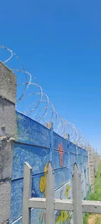 Razor wire and gate installation