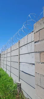 Razor wire and gate installation