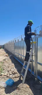 Razor wire and gate installation