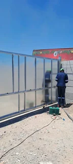 Razor wire and gate installation