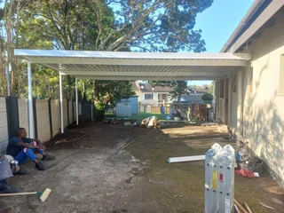 TAR AND CARPORTS