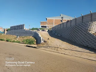 TAR ASPHALT &amp;  RETAINING WALLS